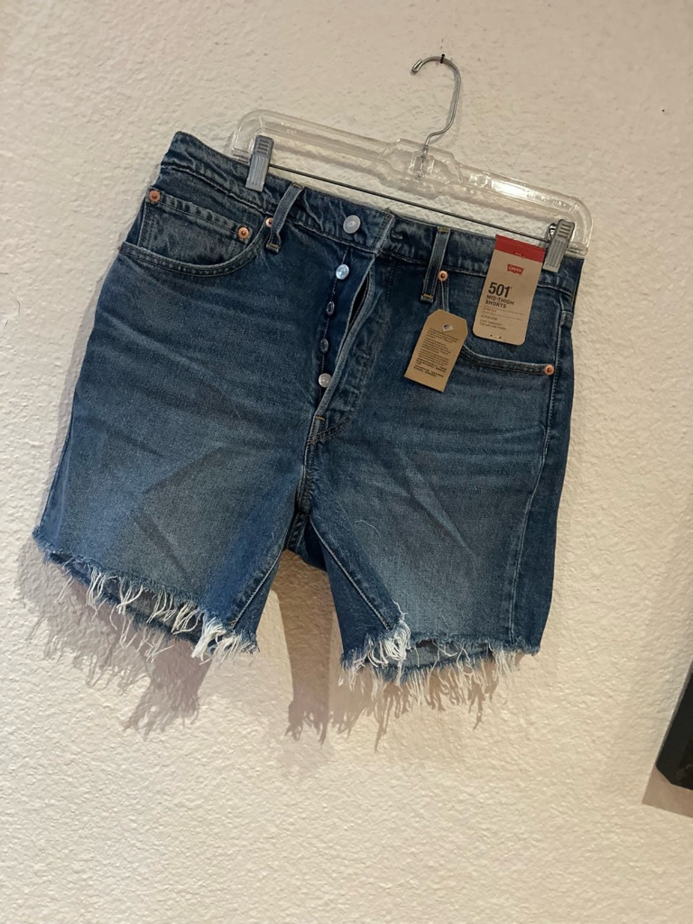 Levi's Denim Cutoff Jean Shorts in Medium Blue Wash mid thigh style (30) - Picture 2 of 5